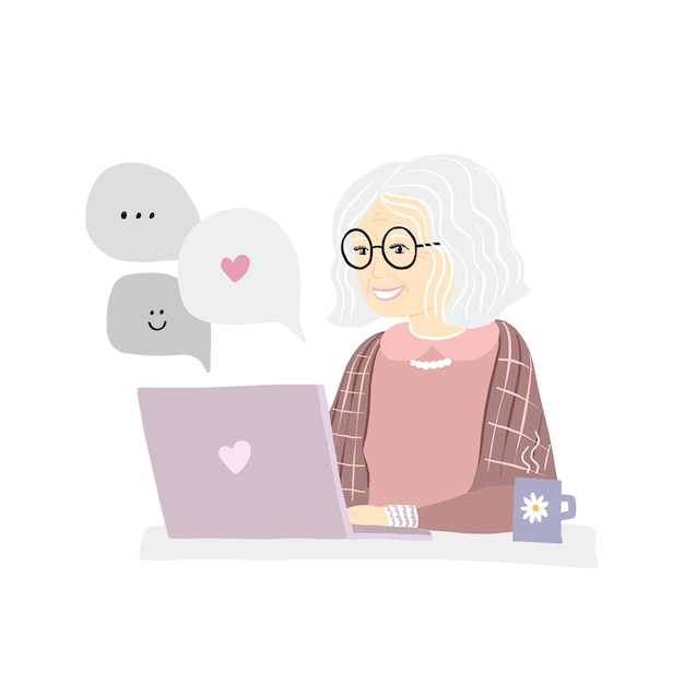 Feliz anciana abuela con laptop