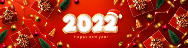 Feliz año nuevo 2022 cartel o pancarta con galletas de jengibre en forma de números 2022