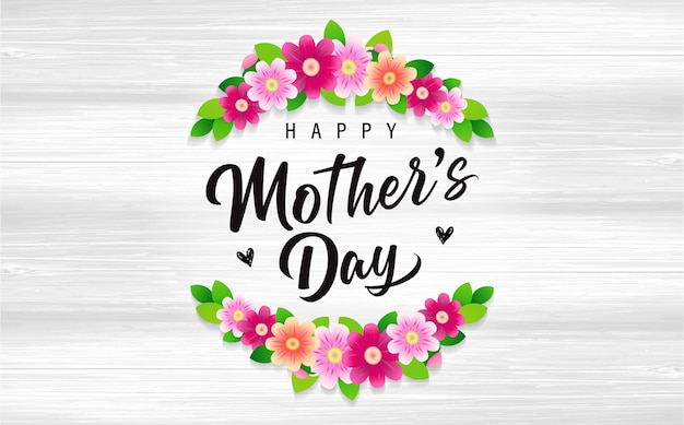 Feliz día de la madre letras y ramas de flores en tablas de madera corona floral del día de la madre