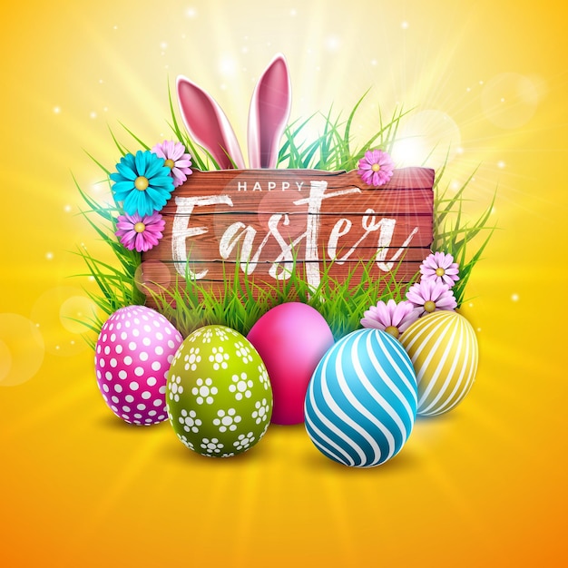 Feliz diseño de vacaciones de Pascua con flor de huevo pintada y orejas de conejo en fondo de madera vintage