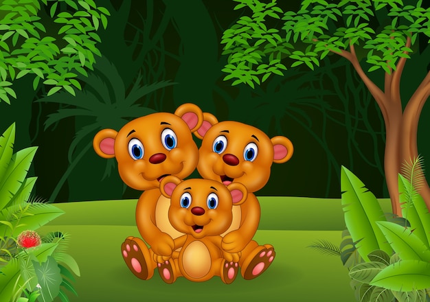 Feliz familia de oso pardo en la jungla