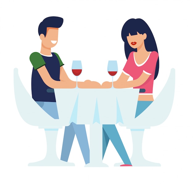 Feliz hombre y mujer hablando durante la cena romántica