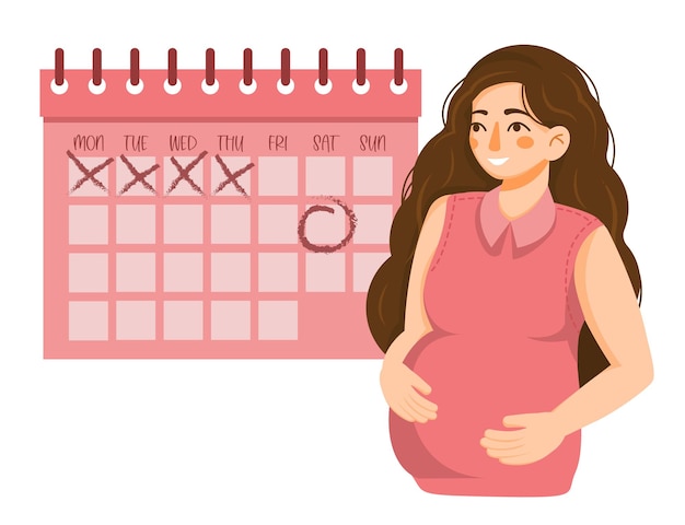 Feliz joven embarazada se encuentra cerca del calendario y sostiene su vientre