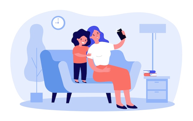 Feliz madre y dulce hija tomando selfie en smartphone