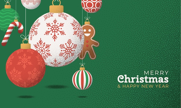 Feliz Navidad y feliz año nuevo tarjeta de felicitación retro colgar en un hilo bola de Navidad bauble en el ruido verde fondo punteado
