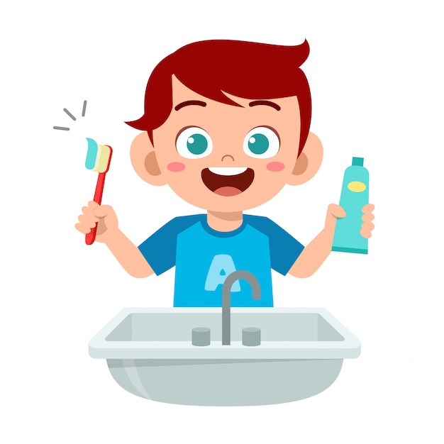 Feliz niño lindo niño cepillo de dientes limpios
