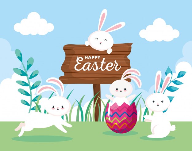 Feliz tarjeta de pascua con conejos en el paisaje