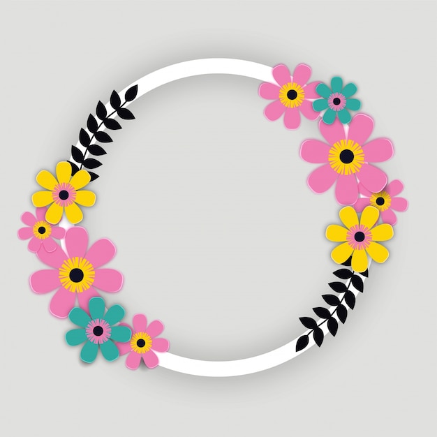 Flores de papel de colores con marco circular.