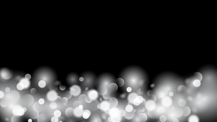 Vector fondo abstracto con efecto bokeh. luces desenfocadas borrosas en colores blancos. luces de bokeh blancas sobre fondo negro.