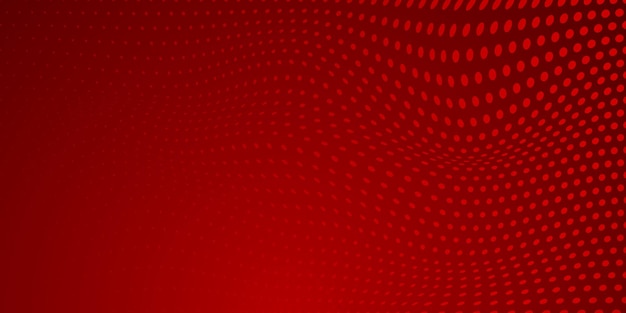 Fondo abstracto hecho de puntos de semitono en colores rojos