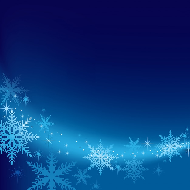Fondo azul de Navidad con copos de nieve