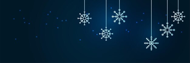 Fondo azul de Navidad con nieve y copos de nieve