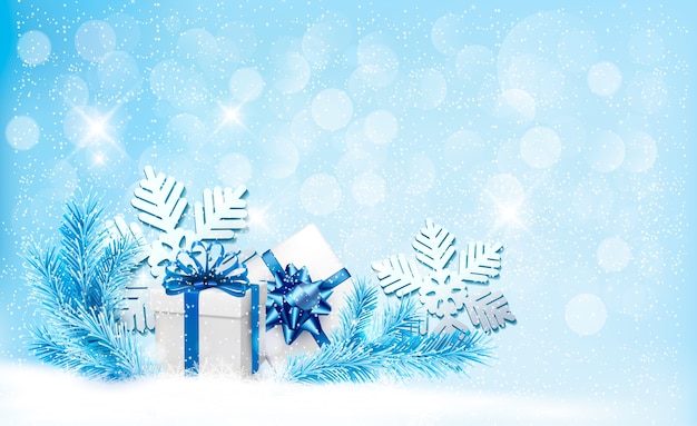 Fondo azul navideño con cajas de regalo y copos de nieve.
