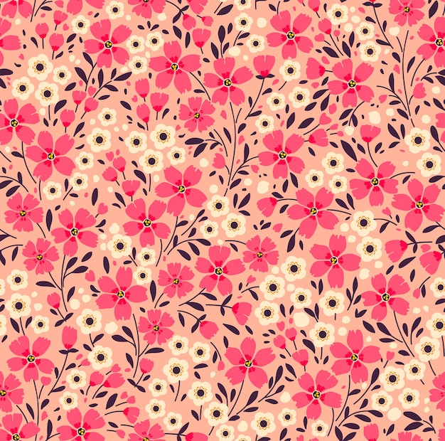 Fondo floral vintage. patrón sin fisuras con pequeñas flores rosas sobre un fondo de coral.