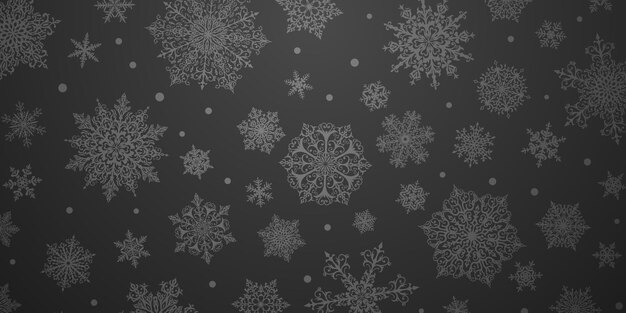 Fondo de navidad de copos de nieve complejos grandes y pequeños en colores negros