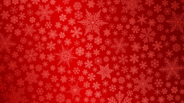 Vector fondo de navidad de copos de nieve grandes y pequeños en colores rojos