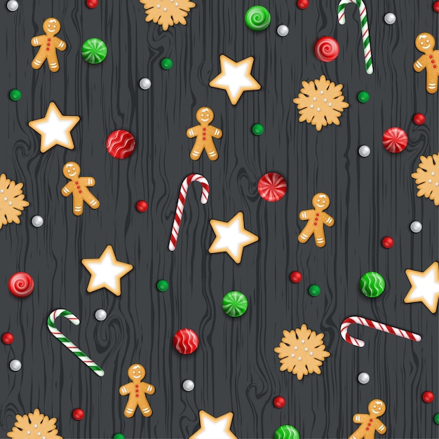 Fondo de navidad, dulces en una mesa de madera negra.