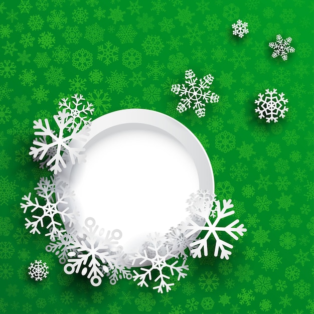 Fondo de Navidad con marco redondo y copos de nieve sobre fondo verde de pequeños copos de nieve