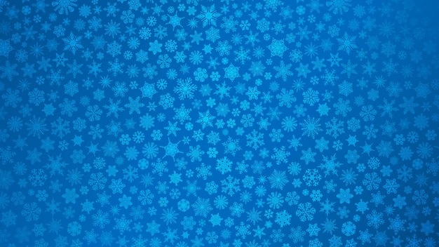 Fondo de navidad de pequeños copos de nieve en colores azules