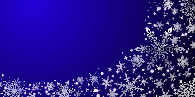 Fondo de Navidad con varios copos de nieve grandes y pequeños complejos, blanco sobre azul