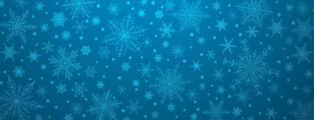 Fondo de navidad de varios copos de nieve grandes y pequeños complejos, en colores azul claro