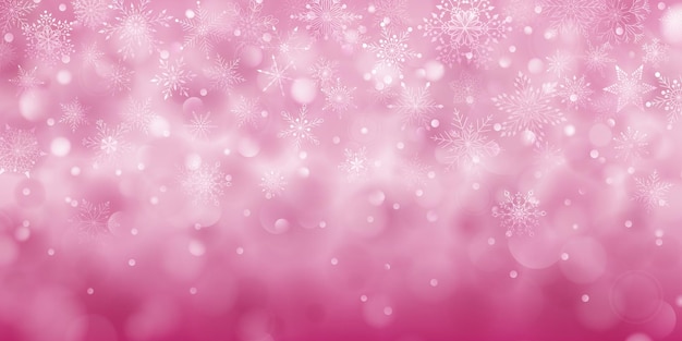 Fondo navideño de complejos copos de nieve cayendo grandes y pequeños en colores rosa con efecto bokeh