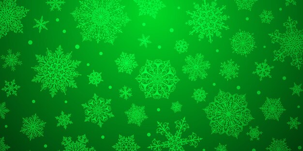 Fondo navideño de copos de nieve complejos grandes y pequeños en colores verdes