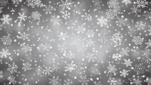 Fondo navideño de copos de nieve de diferentes tamaños de formas y transparencia en colores gris y negro