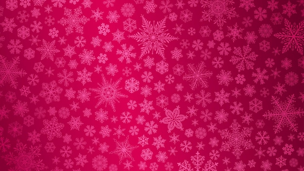 Fondo navideño de copos de nieve grandes y pequeños en colores rosas