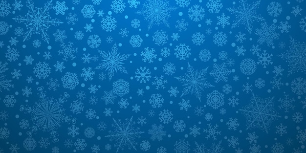 Fondo navideño de varios copos de nieve grandes y pequeños complejos en colores azules