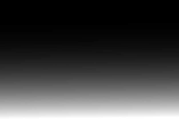 un fondo negro con una luz blanca brillando sobre él
