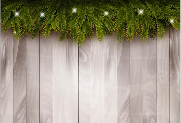 Fondo con ramas de árboles de navidad y adornos delante de una pared de madera. vector.