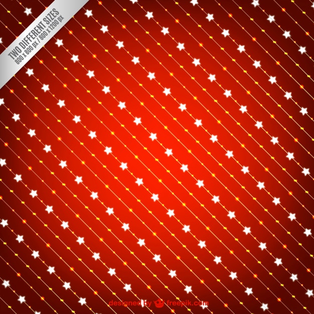 Fondo rojo de navidad con estrellas brillantes