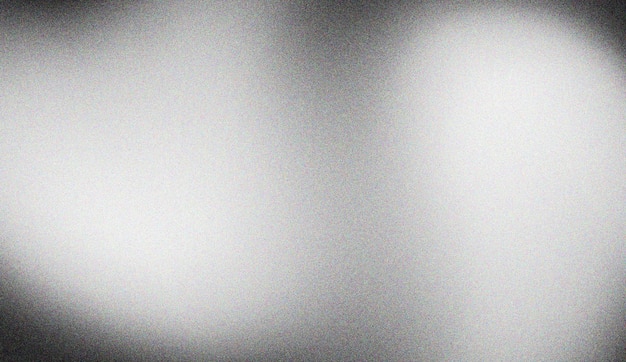 Fondo de textura granulada en blanco y negro con efecto de ruido de luz y sombra abstractos para diseños artísticos