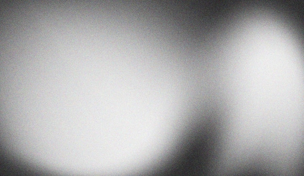 Fondo de textura granulada en blanco y negro con efecto de ruido de luz y sombra abstractos para diseños artísticos