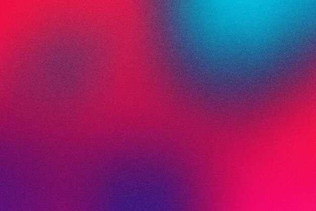 Fondo de textura granulada con gradiente vibrante con tonos de azul rojo y magenta