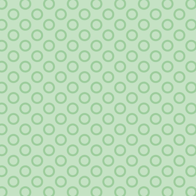 un fondo verde con círculos y puntos