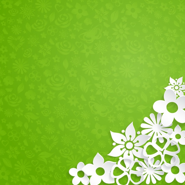 Fondo verde con flores cortadas de papel blanco