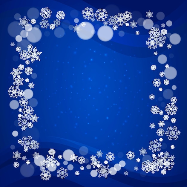 Frontera de Año Nuevo con copos de nieve blancos