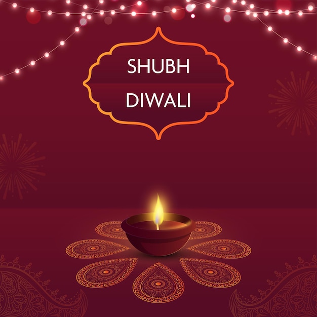 Fuente Shubh Happy Diwali en marco vintage con lámpara de aceite iluminada Diya y guirnalda de iluminación sobre fondo rojo Paisley