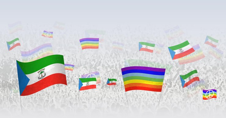 Vector gente agitando banderas de la paz y banderas de guinea ecuatorial