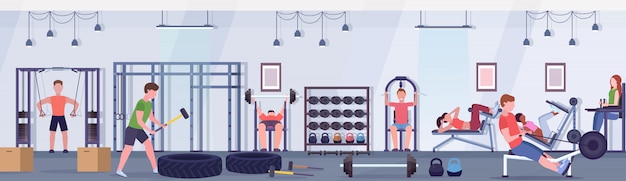 Gente deportiva haciendo ejercicios hombres mujeres trabajando juntos en aparatos de entrenamiento en gimnasio entrenamiento estilo de vida saludable concepto moderno club de salud studio banner horizontal interior