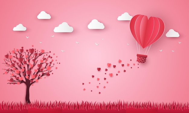 Globo de corazón volando sobre papel de hierba cortado. Feliz día de San Valentín tarjeta de felicitación árbol fondo rosa.