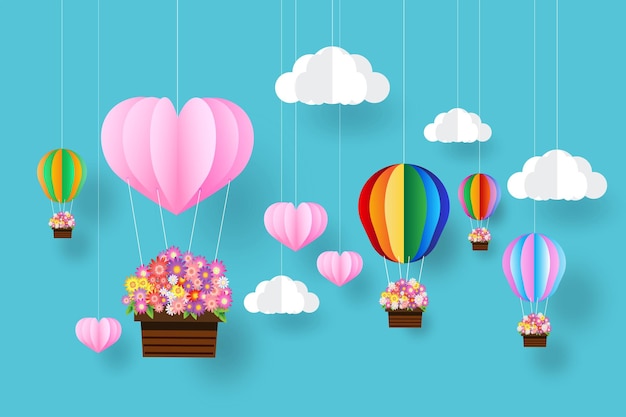 globos de papel de estilo artístico y flores en el cielo
