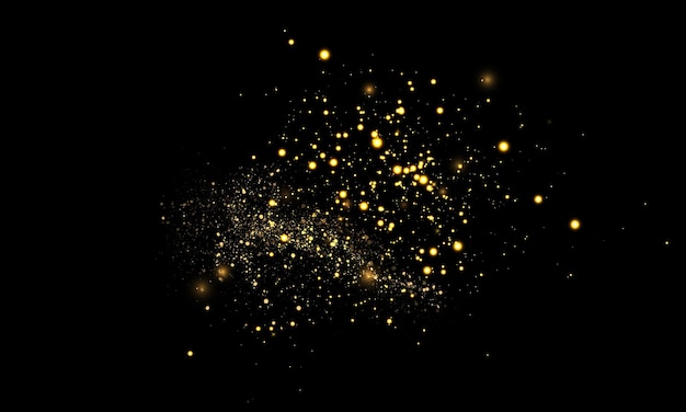 Golden sparkling particles on a black background
