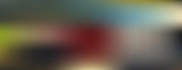Un gradiente abstractamente borroso y granulado con granos digitales coloridos que evocan una falla de VHS vintage
