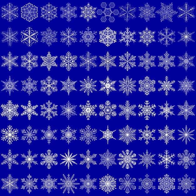 Gran conjunto de complejos copos de nieve de Navidad blanco sobre fondo azul.