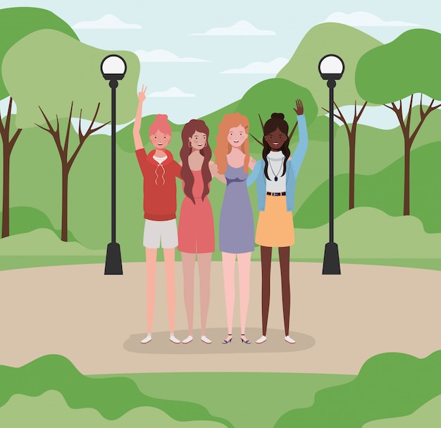 Grupo de chicas jóvenes interraciales en el parque