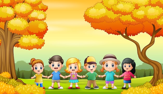 Grupo de niños en el fondo de otoño