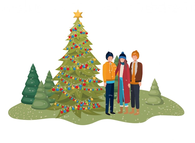 Grupo de personas con árbol de navidad en el paisaje